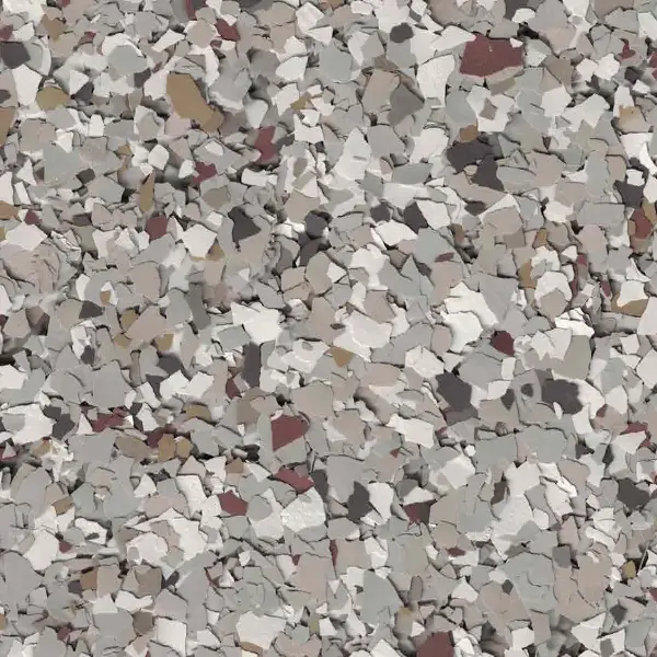 A textured surface composed of scattered, irregularly shaped fragments in various shades of gray, beige, and brown, resembling a speckled stone pattern.